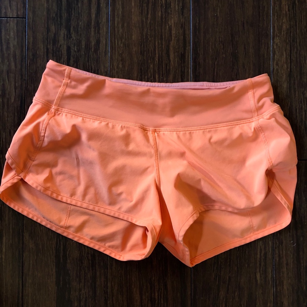 Orange Lululemon shorts